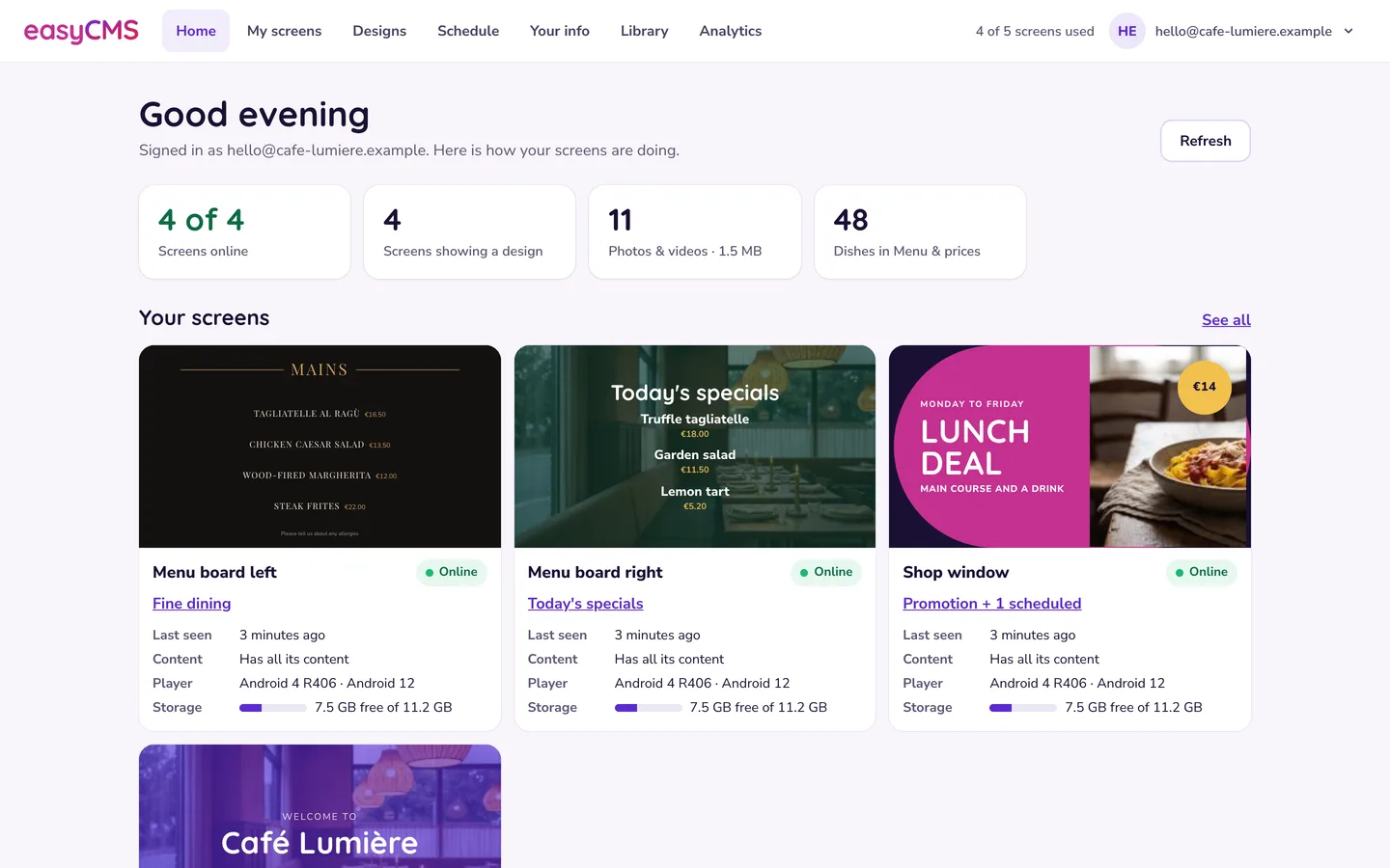 easyCMS Studio's Home page for a café: four screens online, each with a picture of what it is showing, a fine-dining menu, today's specials, a lunch deal and a welcome screen.